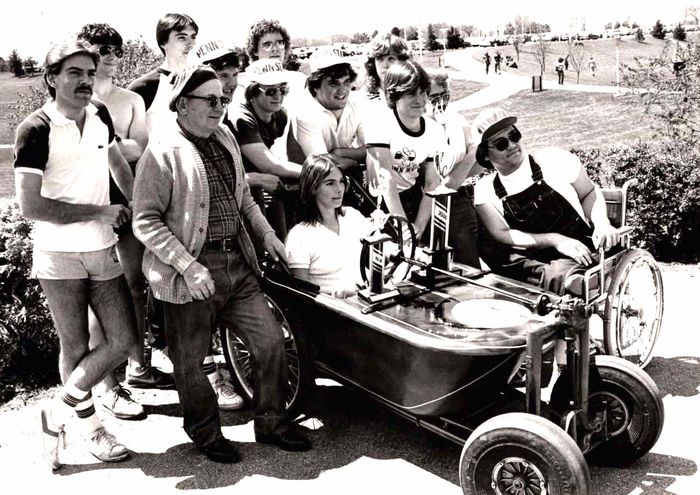 Students in the bath tub derby "race car" they designed