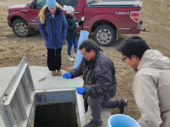 Cheyenne River Tribe member shows students research