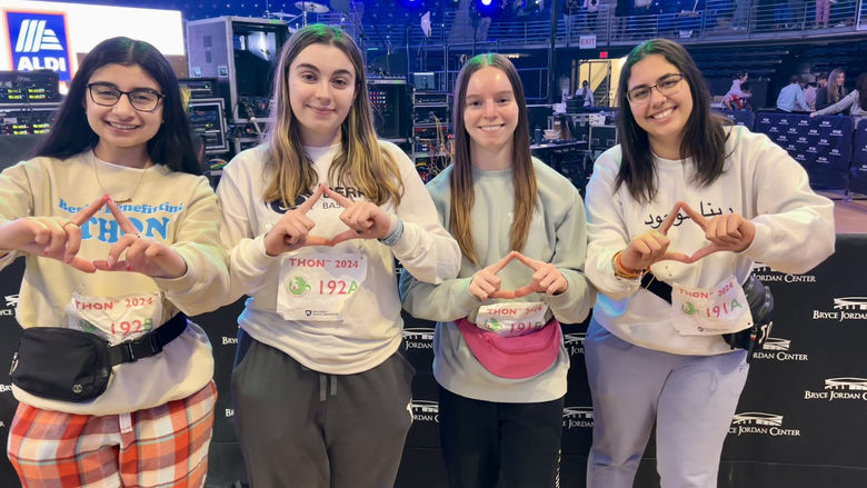 Berks dancers hold up diamonds in recognition of THON
