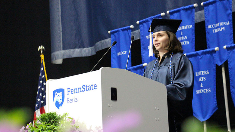 Kaitlyn Pasquarella, student marshal, addresses the graduates