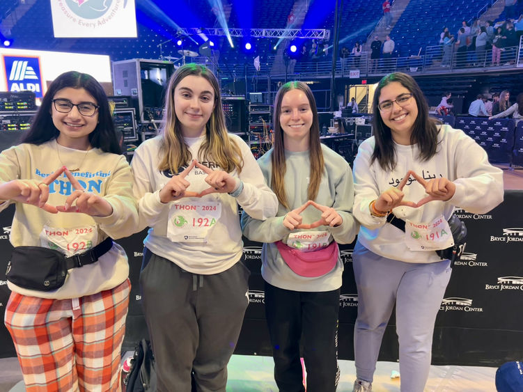 Berks dancers hold up diamonds in recognition of THON