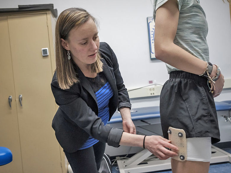 Occupational therapy student working on a patient