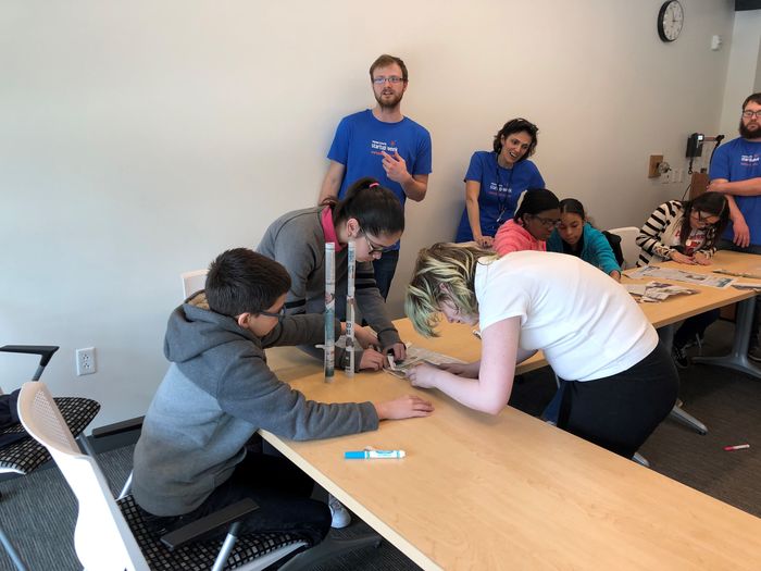 Berks students working with children during startup week.