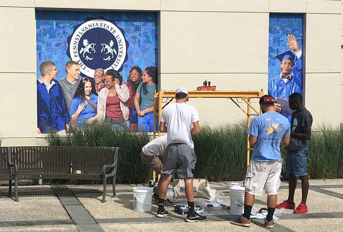 Students helping with the Mural.