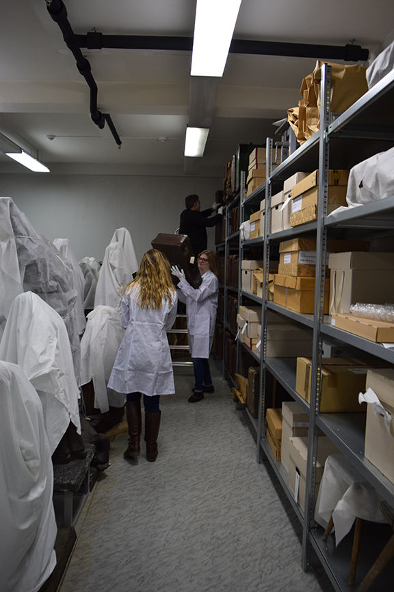 students working in store room