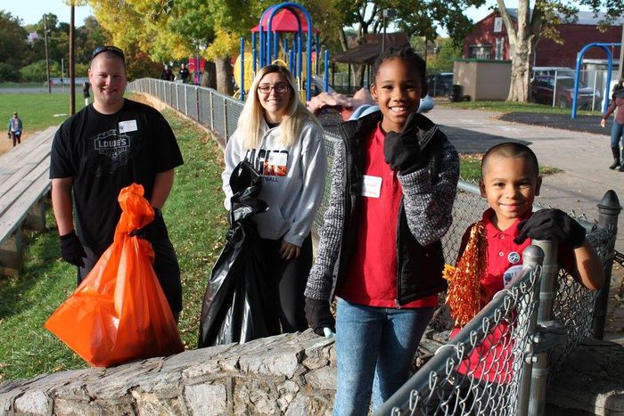 Students and Olivet Club children start a city park cleanup together
