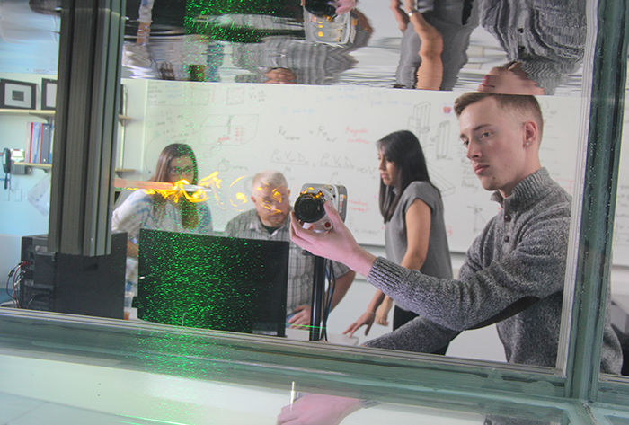 Students and professors collaborate in the Fluid Dynamics Lab on campus