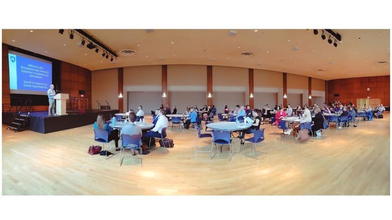 Panoramic view of the 2022 CSUA Substance Use Disorder Stigma Reduction Summit attendees.