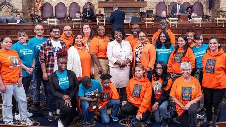 Group of students wearing "Not One More" gear in Harrisburg.