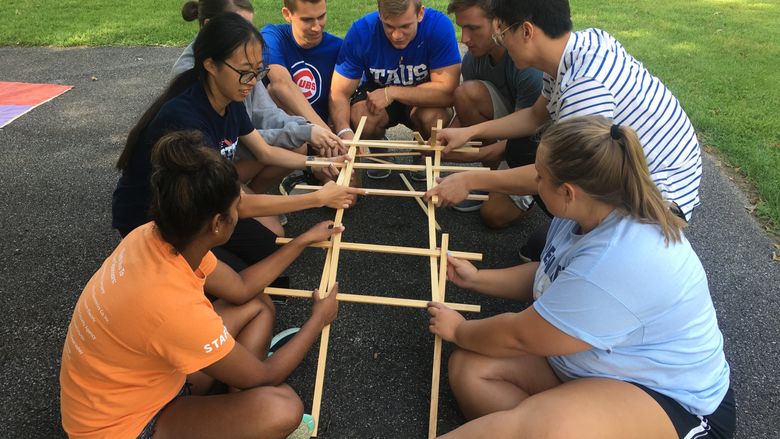 Students use wooden pieces to build replica of the Da Vinci bridge