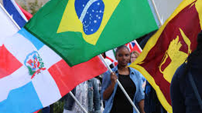 a student holding a flag on unity day.