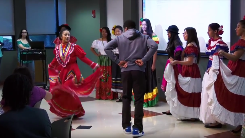 Students dancing at the Multicultural Fashion Show