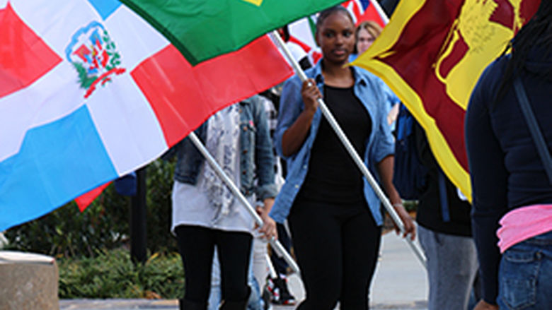 students holding flags during Unity Day