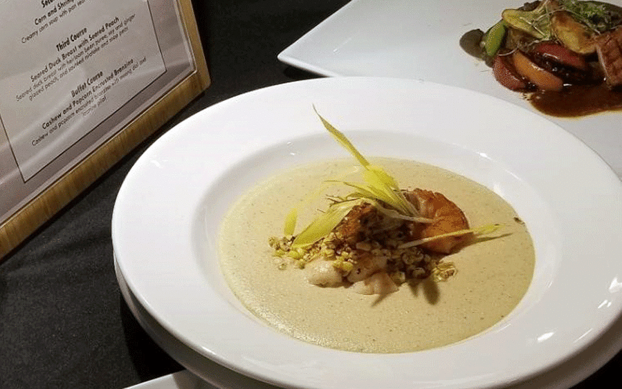 A bowl of corn and shrimp soup