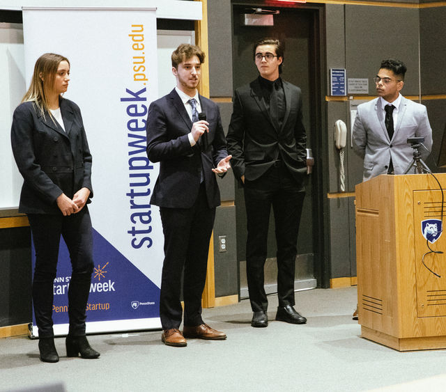 A group of four students pitch their IdeaMakers Challenge idea during Penn State Startup Week.