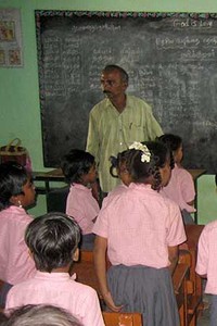 Teacher and students in Indian classroom