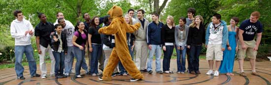 students with Nittany Lion at the Labyrinth