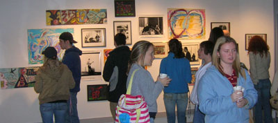Students viewing artwork in Freyberger Gallery
