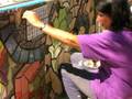 collaborative effort to create mural - student works on mural